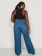 Calça Feminina Plus Size Wide Leg Jeans Tachas Laterais
